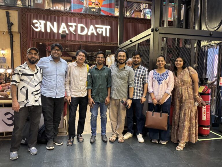 This photo captures the entire incubatee cohort of Eivolve Cohort 4 at their graduation dinner, including Advocate Rishabh Singh.